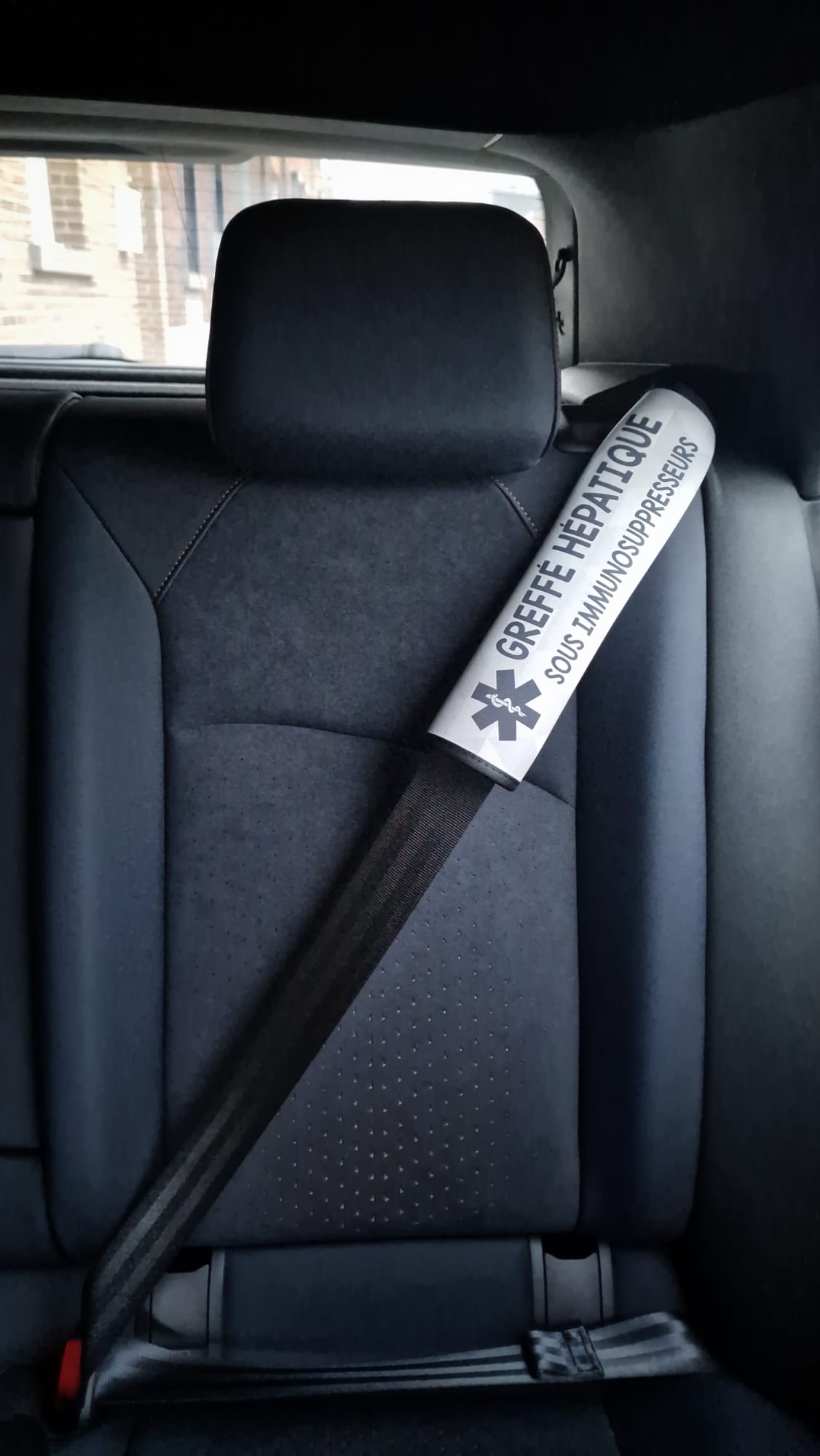 Protège ceinture de sécurité « Greffé. Sous immunosuppresseurs »