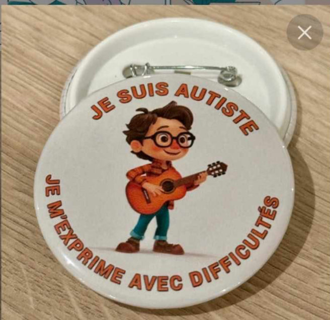 Je suis autiste, je m'exprime avec difficultés. Visuel jeune guitariste.