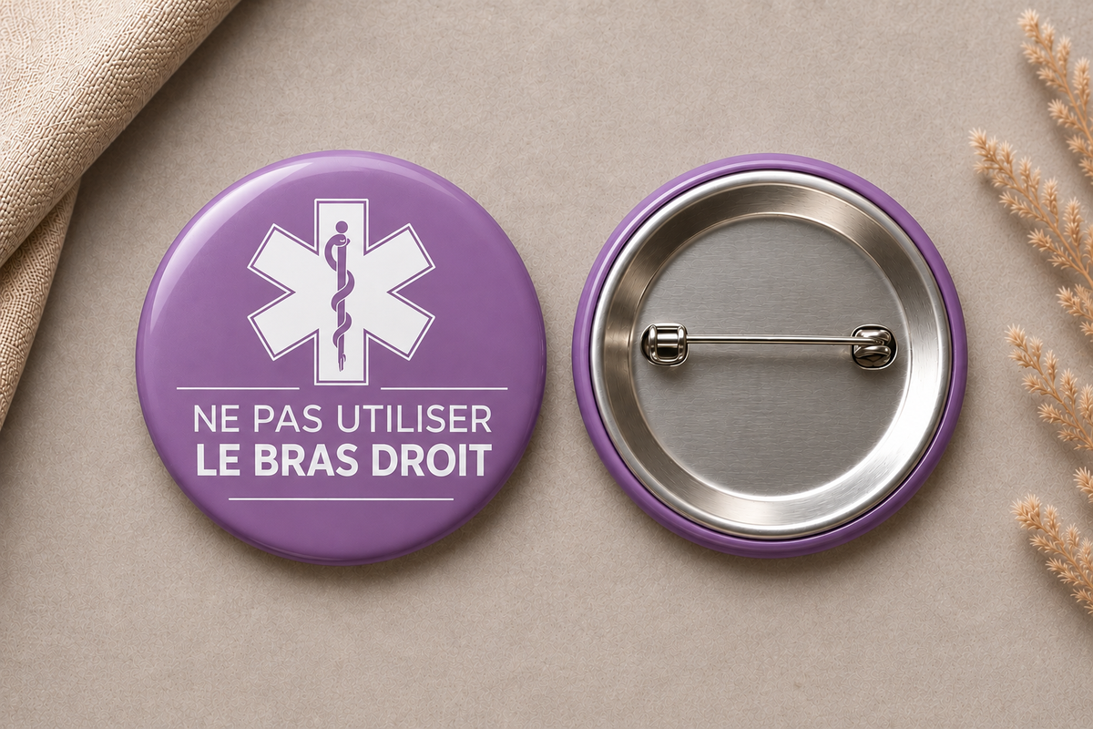Badge cancer du sein et protection du bras.